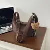 Bolso Retro de Gamuza para Mujer 2026 Nuevo Color Otoño Melade Gran Capacidad para Viajar al Trabajo Hombro Cruzado Forma de Media Luna