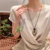 Nuevo Collar con Colgante de Madera Retro Chino para Mujer 2026 Nuevo Diseño de Nicho Estilo Étnico Cadena Larga para Suéter Accesorio