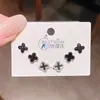 Pendientes Colgantes Negros con Flor de Cuatro Hojas de Aguja de Plata Inspirados en el Diseño, Juego de Tres Pares. Pendientes Exquisitos de Lujo Ligero de Alta Gama, Juego de 6 Piezas