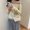 Bolsa Saco Textura Trançada Estilo Coreano para Mulheres 2026 Novo Design de Nicho Bolsa de Ombro Transversal Casual para Trabalho
