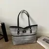 Bolso Tejido de Paja para Mujer 2026 Nuevo Estilo Verano Playa Elegante Bolso de Mano Simple Versátil Hombro Vacaciones Bolso Tejido