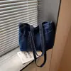 Bolso de mezclilla transfronterizo de gran capacidad para mujer, bolsa de compras ligera y versátil, bolso para estudiantes universitarias, conveniente para ir a clase, bolso de hombro ligero