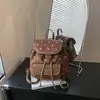 Mochila de lunares nueva transfronteriza 2026, mochila casual de estilo coreano para mujer, gran capacidad, versátil, adecuada para ir al trabajo, diseño simple