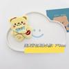 Muñeco de oso de peluche de dibujos animados, delantal, broche de oso, mochila escolar para niña, accesorios decorativos de oso.