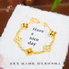Set de Joyería Étnica Chapado en Oro de Xinjiang, Pulsera de Ojo de Tigre con Forma de Trébol de Cuatro Hojas para Mujer, Lujo Ligero, Gama Alta, Accesorio de Mano Versátil