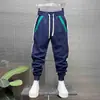 Nuevos pantalones casuales de otoño para hombre, forrados de polar y engrosados, corte slim, con paneles, elásticos, versátiles, pantalones rectos holgados