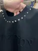 Nueva Camiseta de Manga Corta Suelta con Cuello Redondo y Estampado de Remaches de Acero para Hombre Moda de Primavera Versátil Casual Ropa de Calidad de Moda