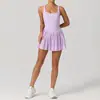 Vestido deportivo europeo y americano sin espalda para mujer, falda plisada anti-exposición para yoga, falda de tenis de secado rápido para exteriores, venta al por mayor