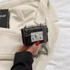 Bolso Pequeño de Cadena Mini Moda de Nicho para Mujer 2026 Nuevo Estilo Coreano Bolso Cuadrado Pequeño Simple Bolso Cruzado Texturizado para Mujer