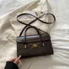Bolso pequeño cuadrado de nicho estilo coreano para mujer, nuevo y moderno de la primavera temprana 2026, versátil, de alta calidad, para hombro y cruzado