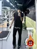 Diseño estampado elegante, pantalones deportivos versátiles para hombre y mujer, estilo americano azul marino, ligeramente acampanados, adelgazantes, pantalones largos casuales