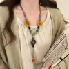 Collar Colgante de Cerámica con Mariposa de Estilo Étnico Exótico y Cordón Largo Tejido para Mujer Accesorios de Cadena para Suéter Retro Estilo Bohemio