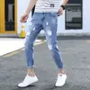 Jeans skinny ajustados de moda estilo coreano para hombre, pantalones casuales elásticos rotos cropped para hombres jóvenes