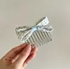 Nuevo peine anti-deslizante estilo coreano con un delicado lazo de mariposa, diseñado para mujeres, creando un peinado alto elegante, y con un elegante pasador lateral y accesorio para el cabello