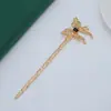 Pasador de mariposa de metal líquido incrustado de diamantes, estilo elegante y minimalista, accesorio para el cabello de nicho simple y lujoso para recogidos