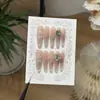 Yizhi GuSúper BrillanteGama Alta Brillante Rosa Ojo de Gato Francés Diseño Tallado Premium K9 Primavera Uñas Portátiles