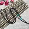 Venta al por mayor del fabricante collar de cuentas de jade de vidrio colgante atado cadena de cuentas colgantes obsidiana calcedonia jadeíta cuerda de colgar línea