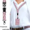 Porta-credencial retráctil fácil de retraer en stock del fabricante, hebilla giratoria de fácil retracción, porta-tarjeta de identificación de trabajo con estampado de leopardo, cordón de poliéster al por mayor