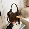 Bolso de Mano para Viajes al Trabajo Estilo Coreano para Mujer 2025 Nuevo Diseño de Nicho de Moda Bolso Cubo de un Solo Hombro para la Axila