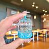 Caja Ciega de Tono Agitable Bolsa Ciega Cuentas de Burbujas Azules Botella Flotante Luminosa Adornos de Arena Movediza Llavero Acrílico Colgante