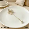 Broche anti-luz broche de perlas de nicho herramienta reductora de talla de cintura botón de pinza de flor para ceñir la cintura pin reductor de talla de jeans