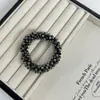 Corea del Sur Dongdaemun Celebridad Cibernética Cristal Hecho a Mano Anillo para el Cabello de Perlas Pulsera Elegante de Celebridad Cuerda para el Cabello de Doble Uso Cuerda para el Cabello de Lujo Ligero