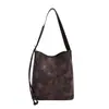 Elegante bolso tote de gamuza, simple y chic, perfecto para estudiantes, para ir al trabajo y para el uso diario en la temporada de otoño 2025