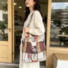 Bolsa de mano de algodón floral estilo coreano, un bolso versátil y elegante que se puede llevar en la mano o colgar al hombro, perfecto para estudiantes mujeres, ligero y con gran capacidad, ideal para llevar libros a clase