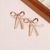 Pendientes de lazo de metal de moda de verano, joyería transfronteriza europea y americana, pendientes franceses de alta gama con atmósfera retro para mujer.