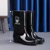 Botas de lluvia impermeables, engrosadas y antideslizantes de corte bajo con forro de felpa y suelas gruesas; botas largas impermeables; botas de lluvia de caña alta, antideslizantes, con punta de acero; resistente al desgaste