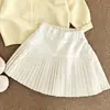 Conjunto de Otoño para Niña 2026 Nuevo Estilo Coreano Bebé Amarillo Dulce Chaqueta Fina de Punto Falda Corta Plisada