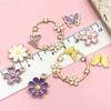 Colgante de Mariposa Hueca Flor de Amor Margarita Flor de Cerezo Joyería Accesorios DIY Collar de Flores Pulsera Accesorios para Mujer Colgante Venta al por Mayor