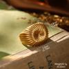 Estilo de corte europeo y americano oro ruso nicho nuevos aretes medievales borla perla diseño ojo de tigre aretes de alta gama