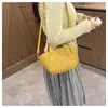 Nuevos bolsos pequeños de moda para mujer, populares este año, bolsos de nicho a la moda, bolsos de hombro y cruzados simples y versátiles