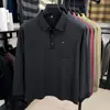 Camiseta de manga larga a rayas para hombre con bolsillos reales, polo simple y versátil, nueva camiseta casual de negocios para otoño e invierno para hombres de mediana edad