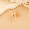 Pasador de resorte de mariposa dorada tridimensional Zhuang Zhou Xiaomeng mariposa DIY tocado antiguo clip de presión de personalidad clip lateral al por mayor