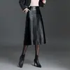 Elegante falda midi de color liso, minimalista, con abertura en el bajo para mujer, nueva colección otoño 2026, de talle alto, estiliza, corte A, moderna