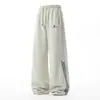 Calça Jogger Casual Solta da Marca da Moda para Homens, Estilo Primavera com Listras Coloridas nas Laterais, Punhos Ajustáveis, Calça Esportiva