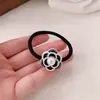 Anillo para el cabello con camelia pequeña y fragante, elegante y bajo, para mujer, con correa para el cabello, cuerda elástica duradera y accesorios para el cabello.