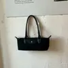 Bolsa baguette de luxo estilo francês, bolsa de bolinho moderna e da moda, adequada para o trajeto diário, bolsa de ombro e sob o braço versátil e moderna