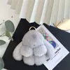 Pingente de chaveiro de carro de alta qualidade feminino Coreia do Sul criativo fofo celebridade da internet ins boneca de pelúcia coelho pingente de mochila escolar