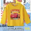 Ropa infantil transfronteriza temática del coche Rayo McQueen, ropa de primavera y otoño para niños, camiseta básica de algodón para niños, camiseta de manga larga raglán