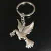 Venda direta Festival pequeno presente metal criativo pássaro pombo galo animal chaveiro LOGO a laser presente publicitário