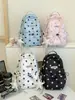 Mochila estrellada estilo ins coreano para estudiantes mujeres, adecuada para ir a la escuela, mochila pequeña de gran capacidad y alto atractivo estético