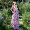 Conjunto de vestido de vacaciones en la playa Nanfa Yunhai: Top de tubo sin hombros + falda larga estampada floral