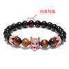 Accesorios transfronterizos nuevo pulsera de pareja de ojo de tigre de 8 mm ágata negra cobre lobo pulsera de corona pequeña joyería al por mayor
