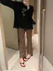 Pantalones retro de leopardo de estilo nicho ligeros para otoño para mujer, pantalones cropped holgados adelgazantes de principios de otoño con microcampana