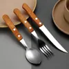 Cubiertos Western de Acero Inoxidable Hotel Restaurante Regaliz Mango de Madera Cuchillo para Bistec Tenedor Cuchara Juego de Tres Piezas Venta Directa del Fabricante