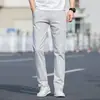 Calças Casuais Respiráveis Elásticas para Jovens Homens 2026 Nova Coleção Primavera e Verão Algodão Puro Slim Reto Calças Longas Masculinas