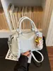 Bolsa Boston de Design de Nicho Feminina 2026 Nova Bolsa de Mão de Alto Padrão para o Trabalho Bolsa de Ombro Único Transversal Bolsa Almofada